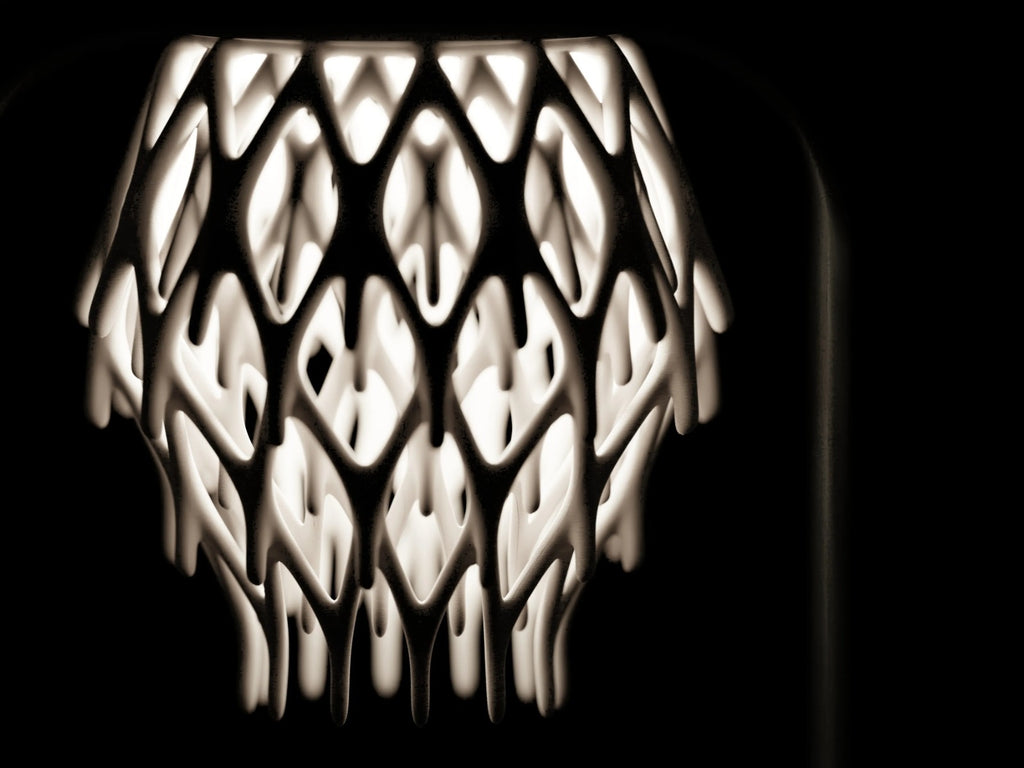 Tessar – Grown from light. Framed by shadow.
